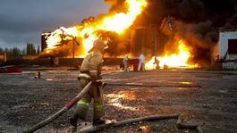 Hasiči pracujúci na mieste po ostreľovaní...