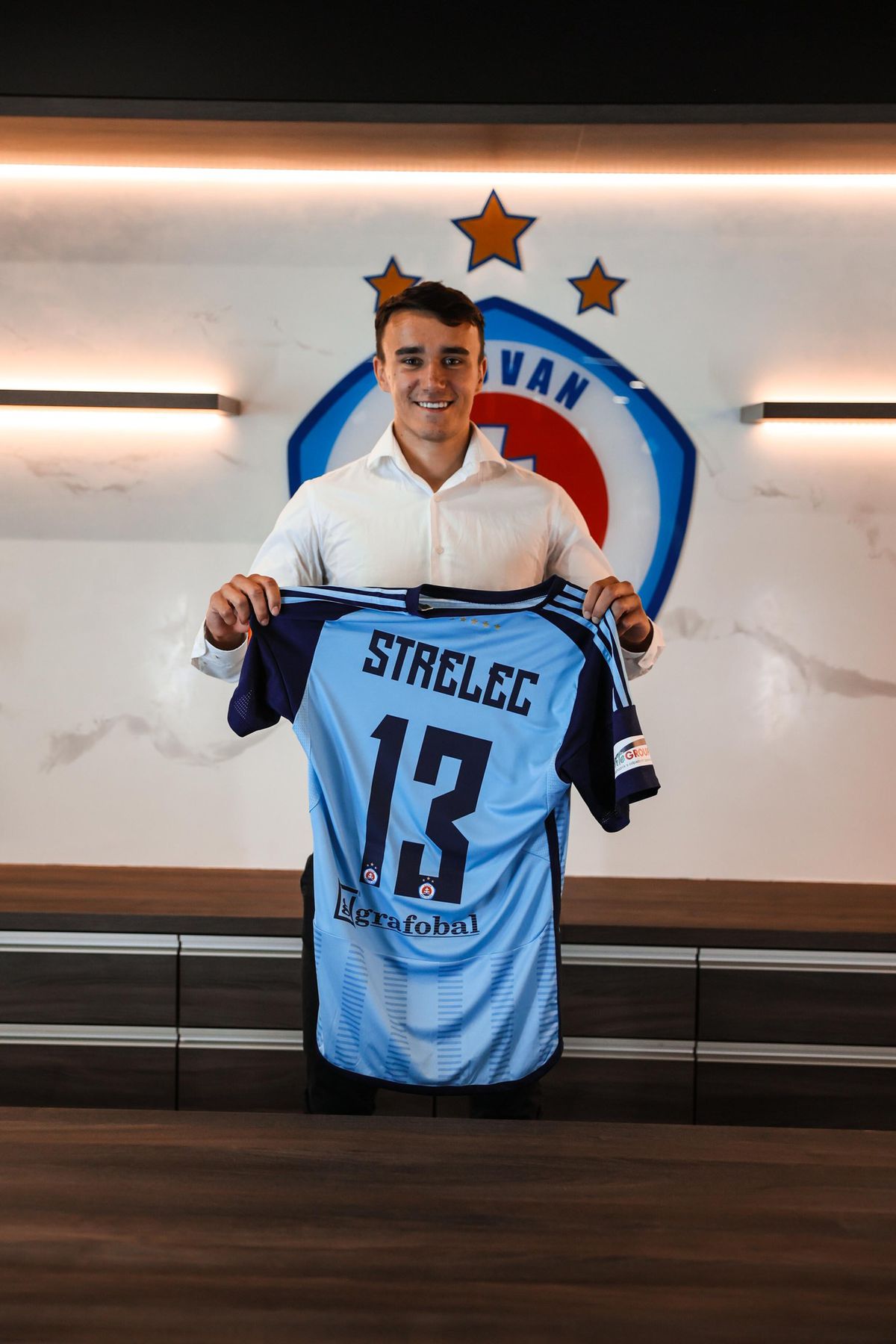 David Strelec after signing a contract with Slovan...