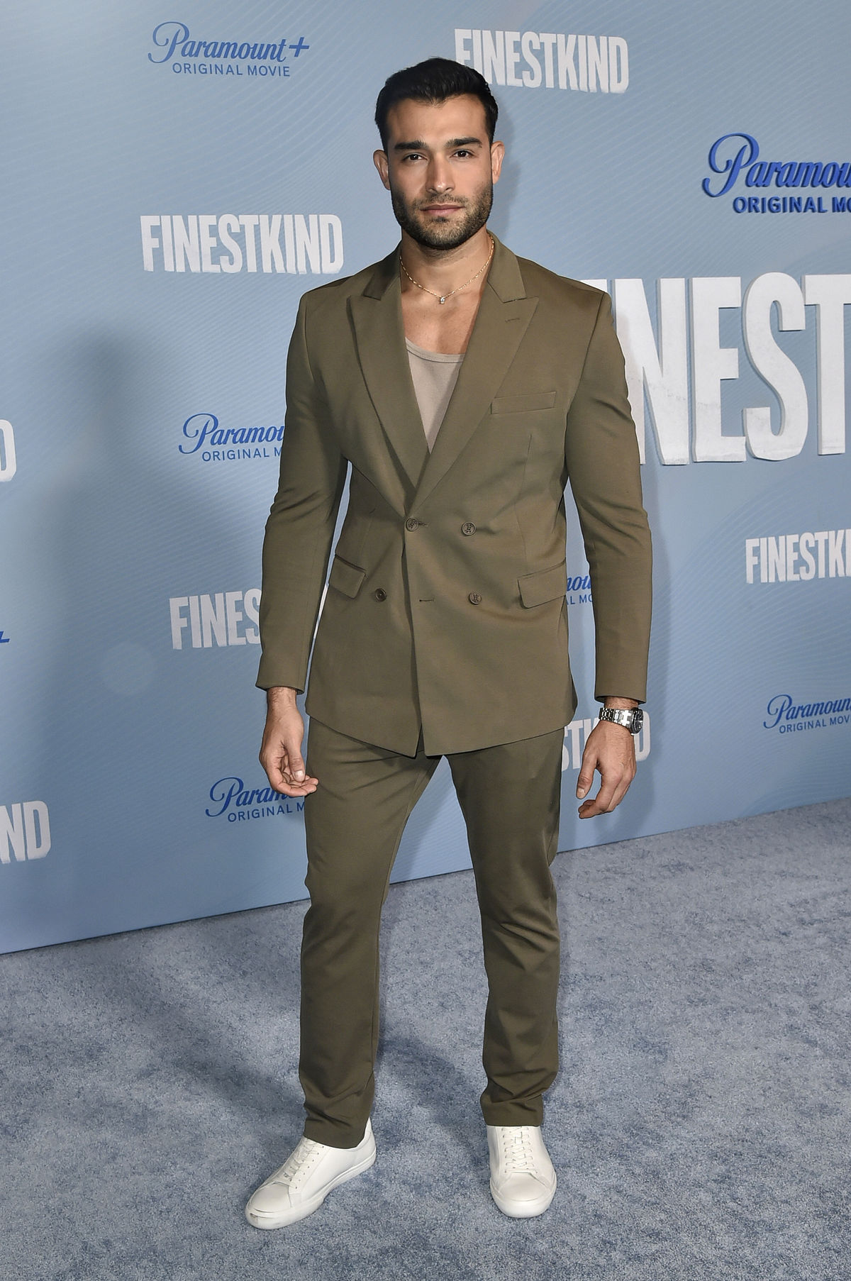 Model, tréner a herec Sam Asghari na premiére...