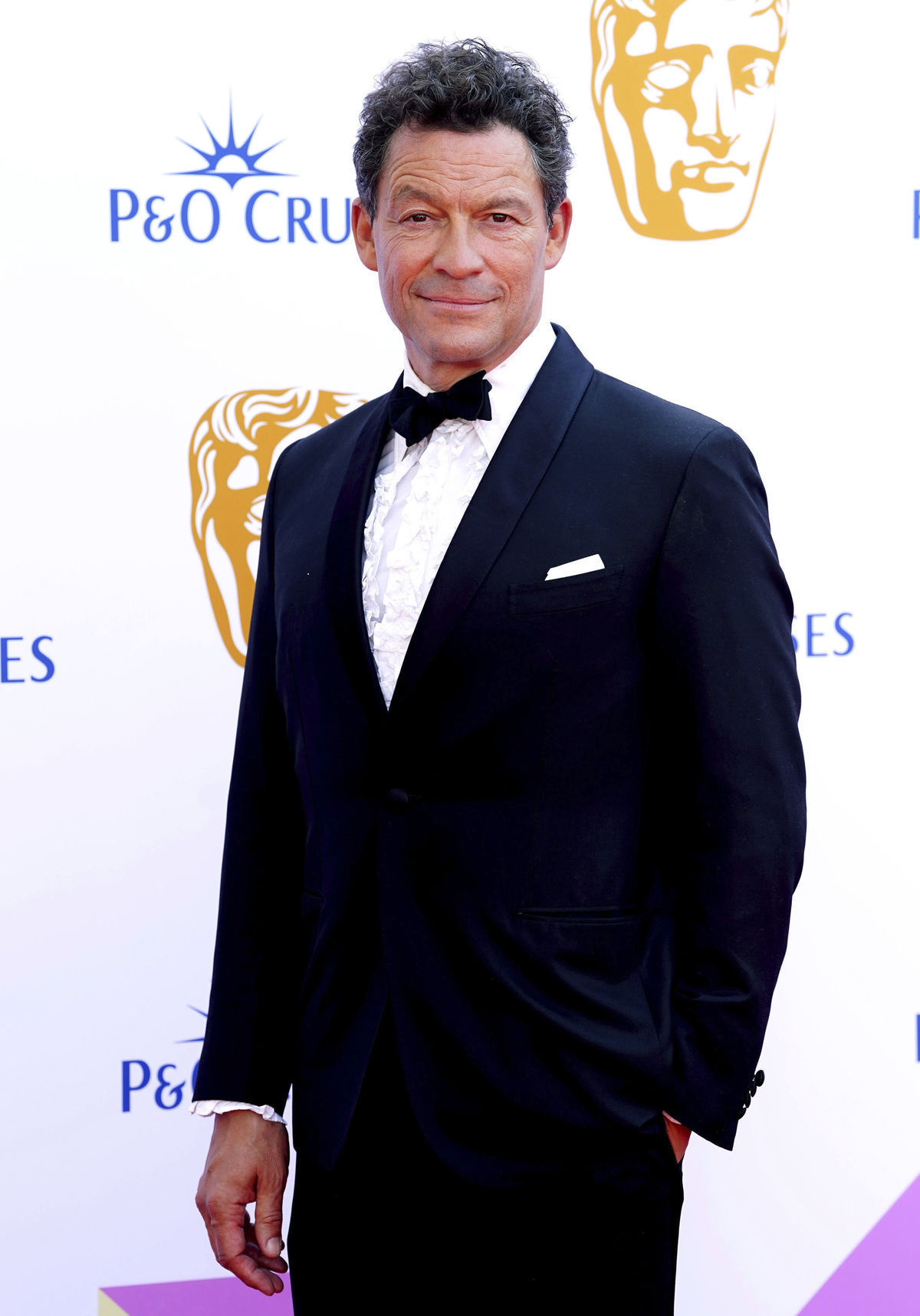 Herec Dominic West.