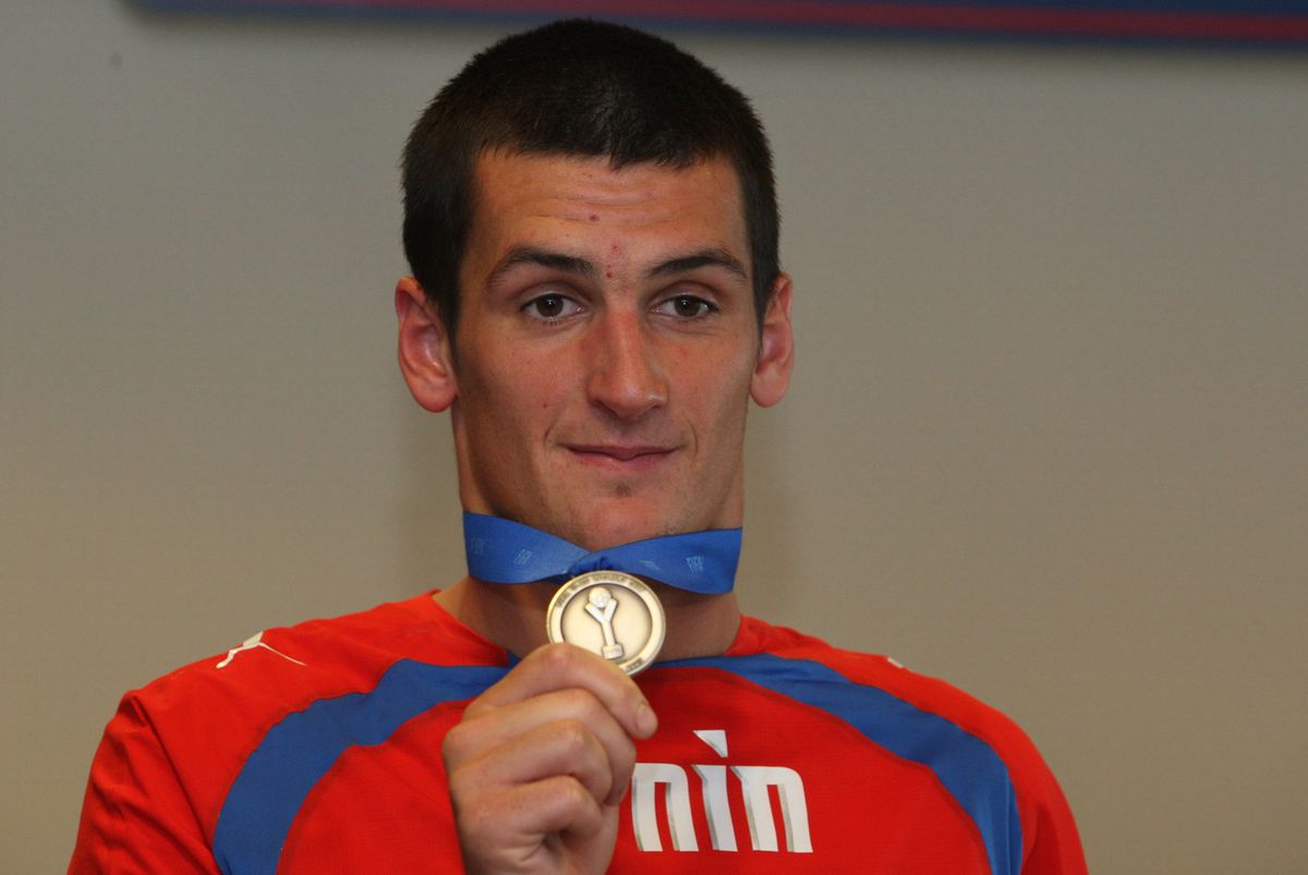 Fenin Martin with a medal from the U20 WC in 2008.