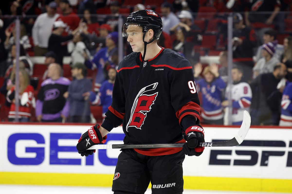 Yevgeny Kuznetsov in Carolina Hurricanes jersey.