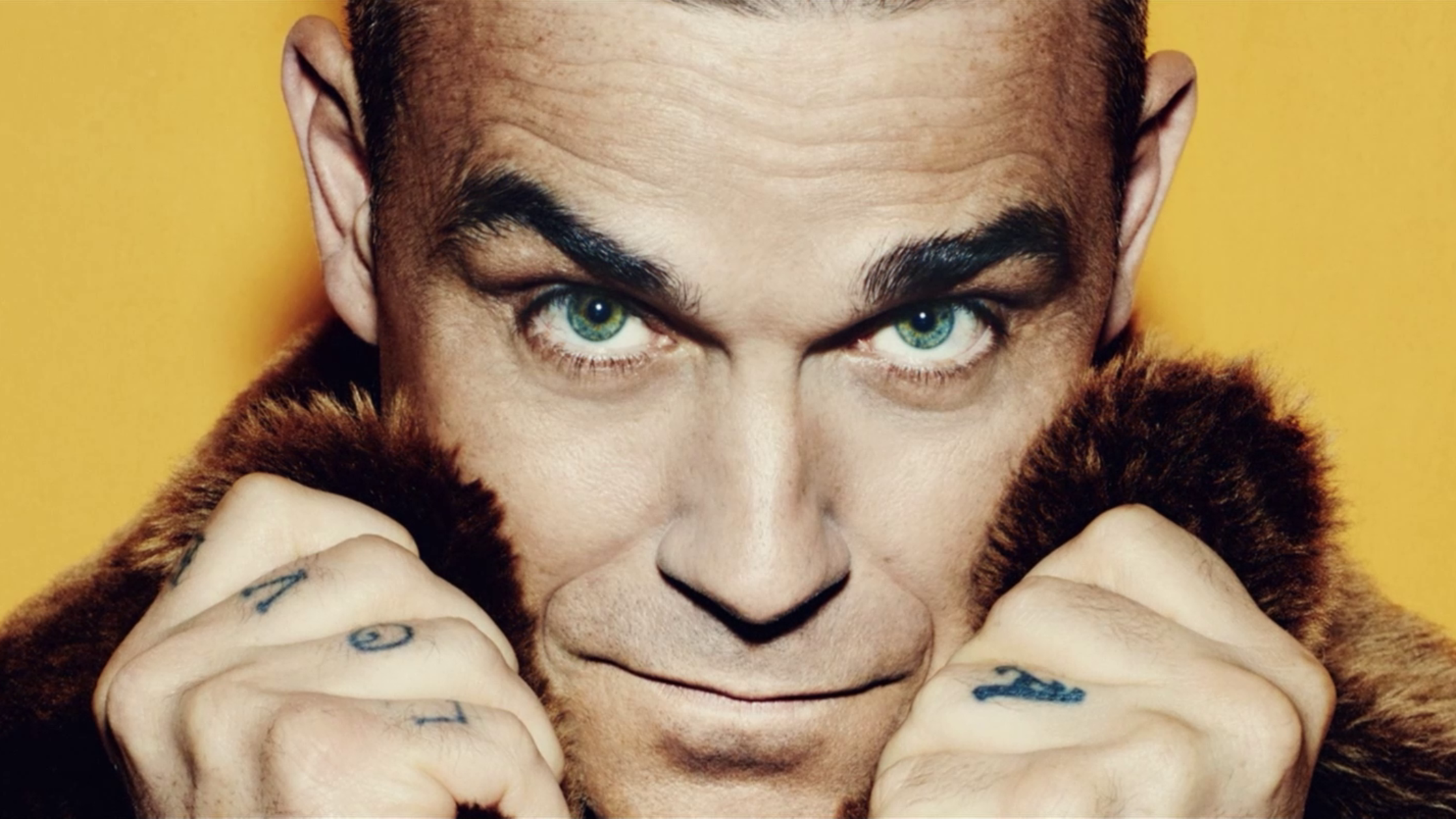 spevák Robbie Williams