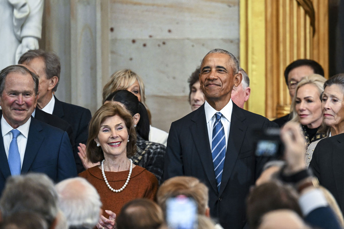 Bývalý prezident George W. Bush, jeho žena...