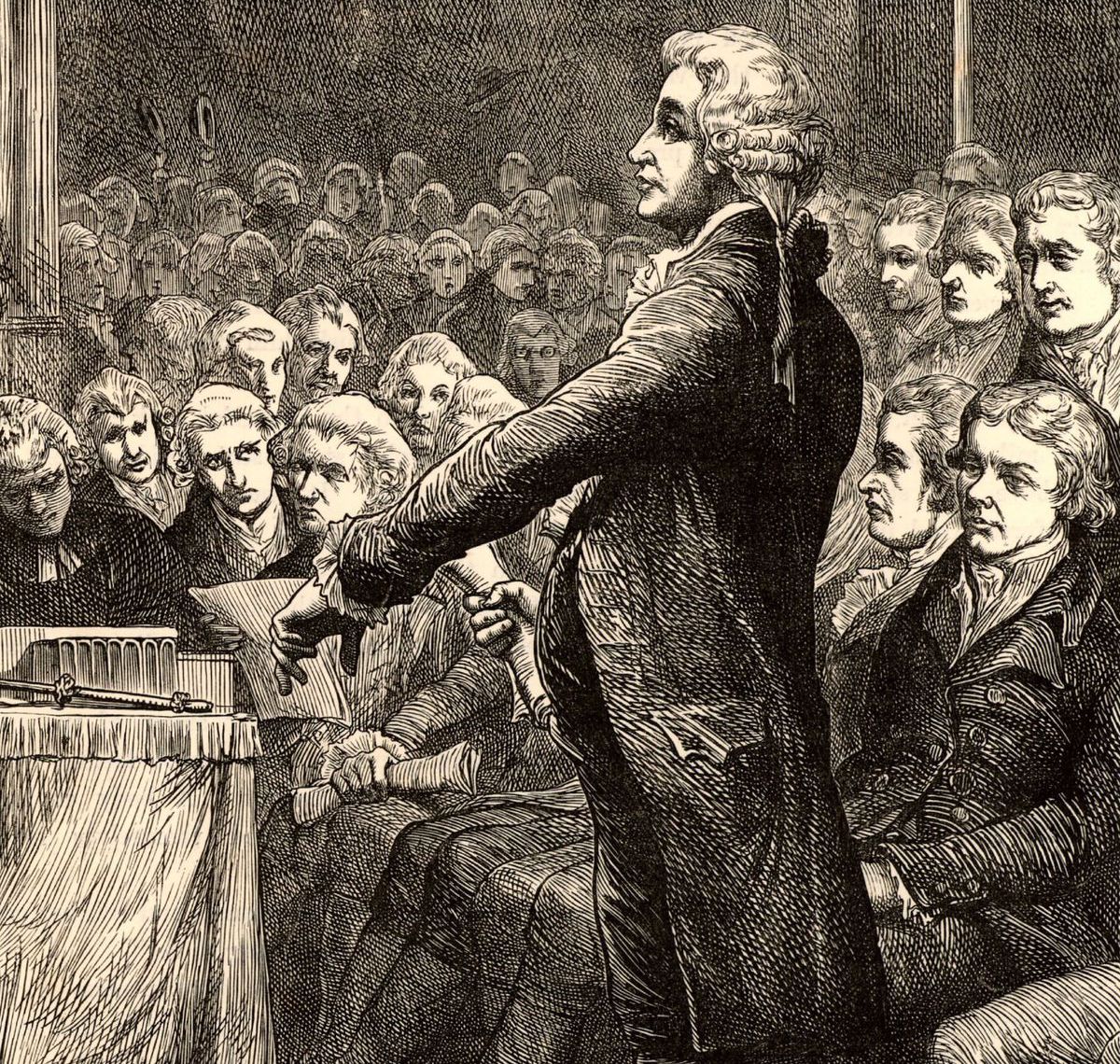 Edmund Burke pri prejave v Dolnej snemovni...