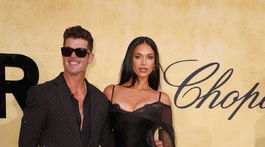 Spevák Robin Thicke a jeho manželka April Love Geary.