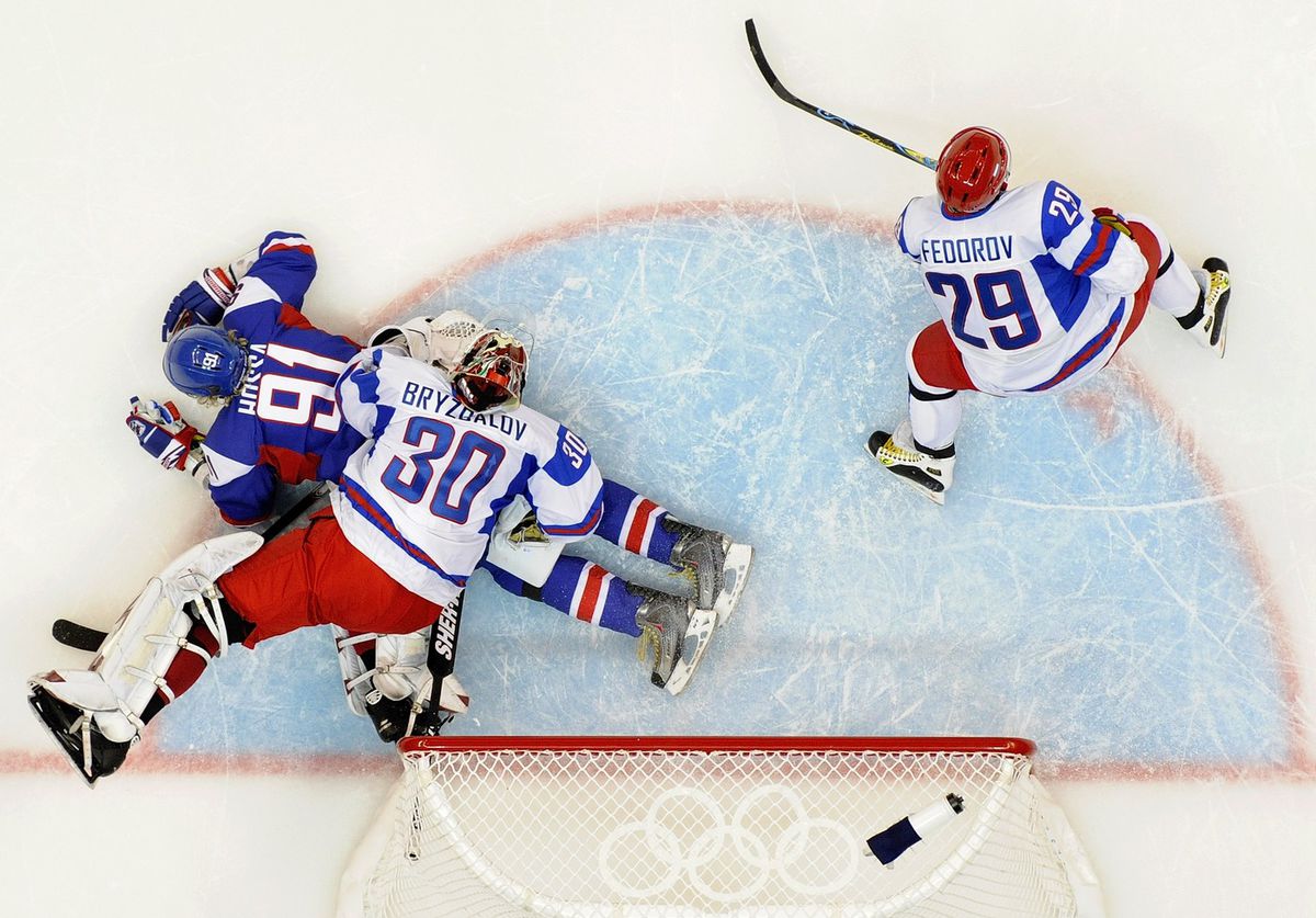 Ilja Bryzgalov, Sergej Fiodorov a Marcel Hossa...