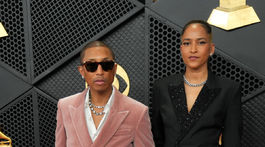 Raper, producent a dizajnér Pharrell Williams a jeho manželka Helen Lasichanh.