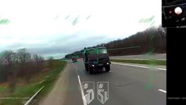 The drone interface highlights vehicles on the route in...